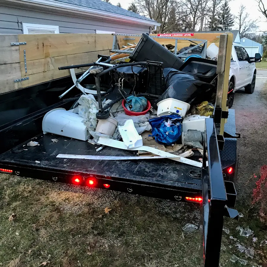 Roll-off dumpster delivered to a residential driveway in St. Stephens